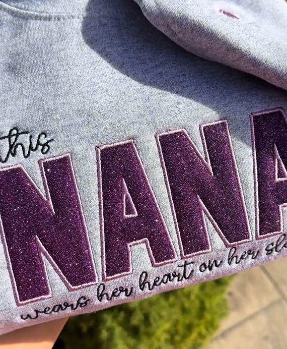 custom-glitter-mama-wears-her-heart-on-her-sleeves-embroidered-sweatshirt-mother-s-day-gift