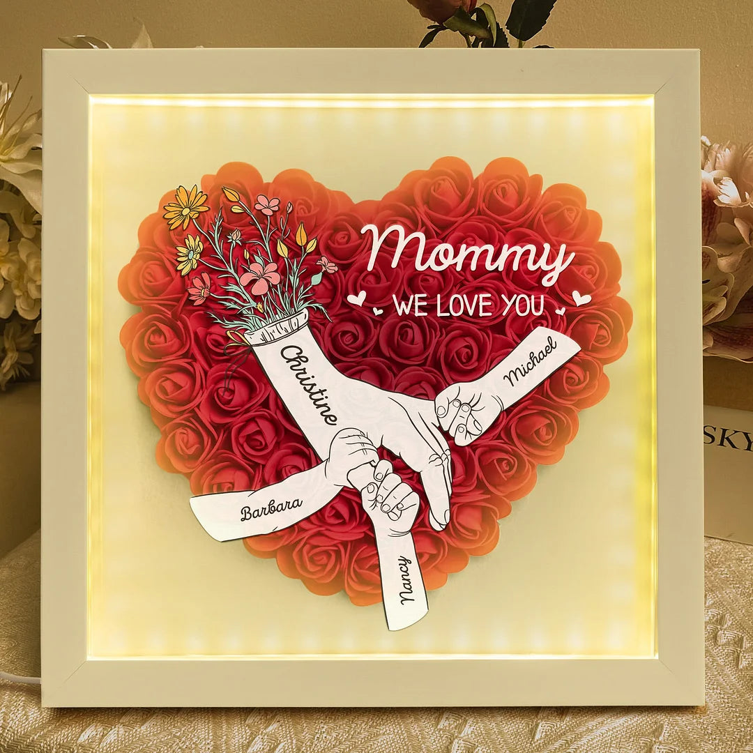 mom-hands-holding-we-love-you-personalized-flower-shadow-box-with-led-light