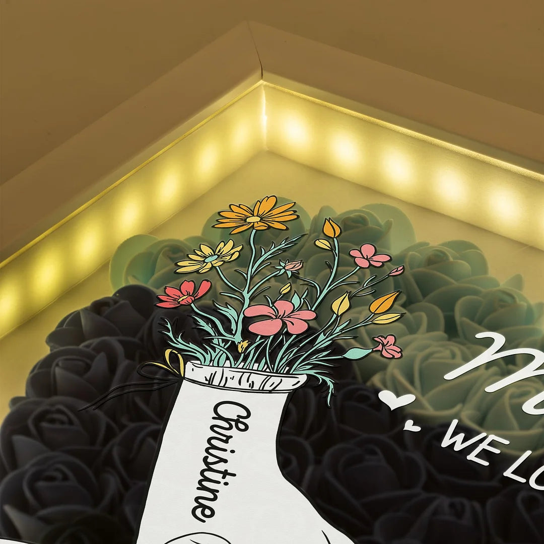 mom-hands-holding-we-love-you-personalized-flower-shadow-box-with-led-light
