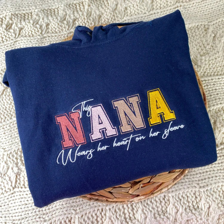 custom-this-nana-wears-her-heart-on-her-sleeve-sweatshirt-with-kids-names