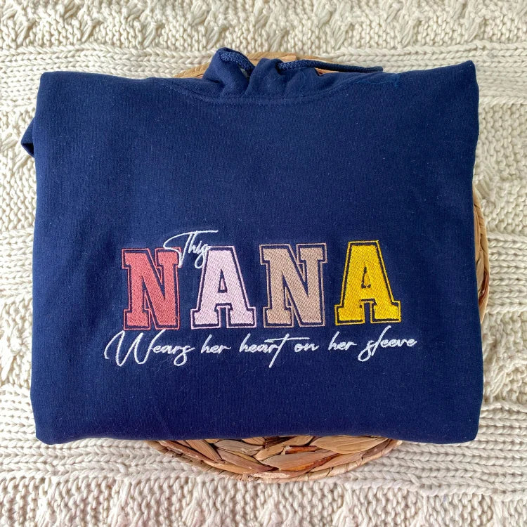 custom-this-nana-wears-her-heart-on-her-sleeve-sweatshirt-with-kids-names
