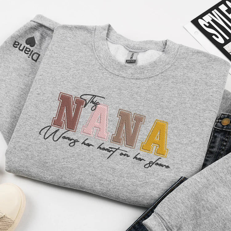 custom-this-nana-wears-her-heart-on-her-sleeve-sweatshirt-with-kids-names