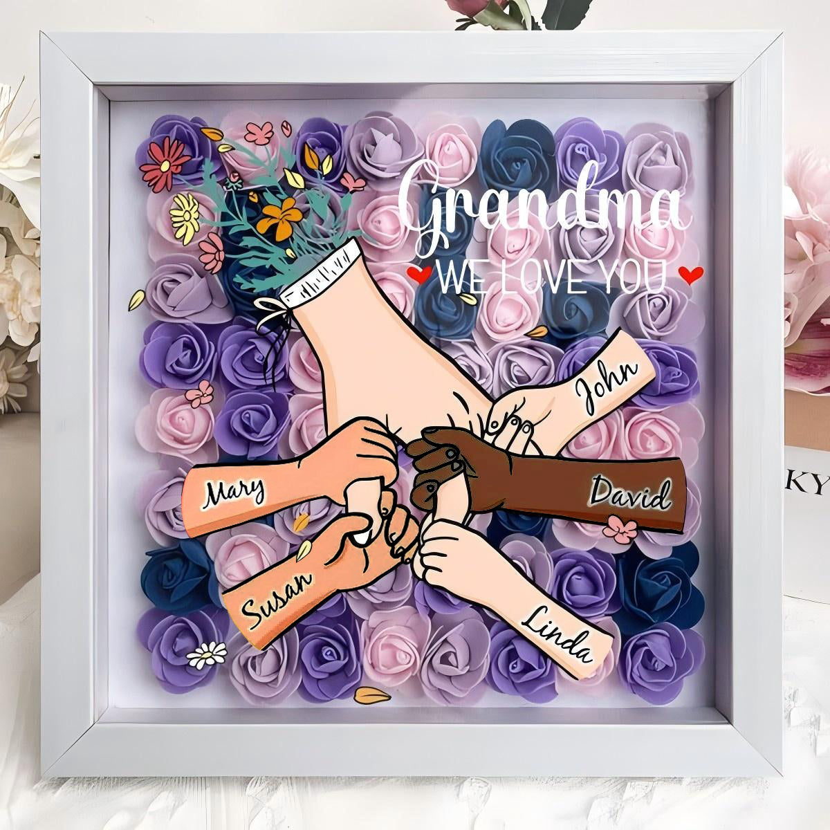 custom-hand-holding-family-flower-shadow-box-with-multiracial-family-different-skin-tones-mother-s-day-gift