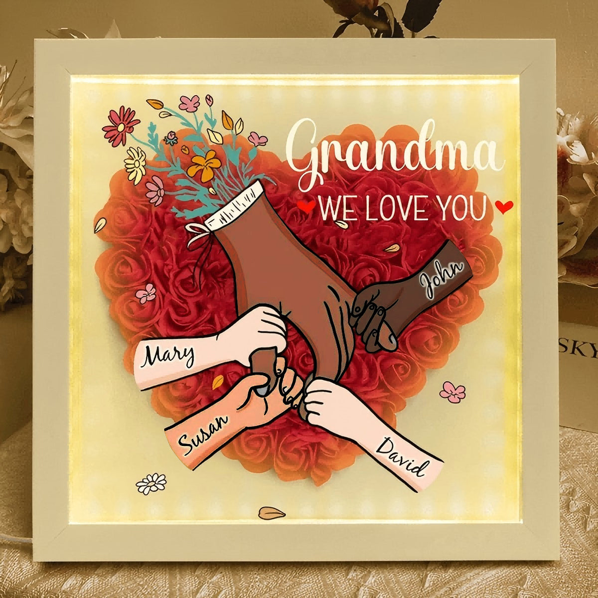 custom-hand-holding-family-flower-shadow-box-with-multiracial-family-different-skin-tones-mother-s-day-gift