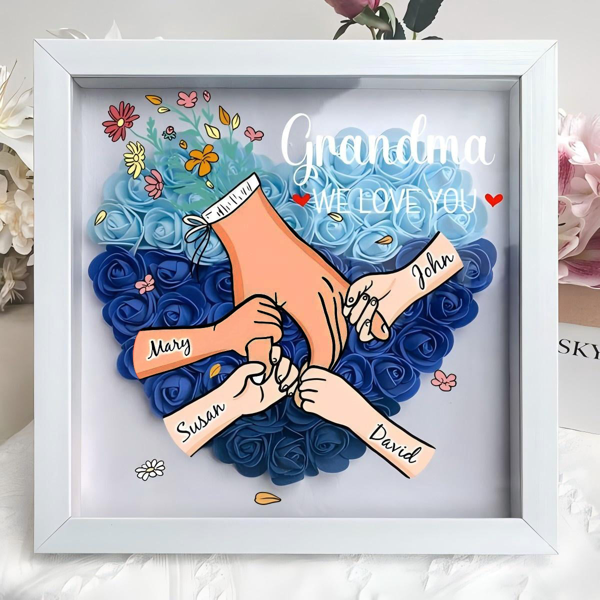 custom-hand-holding-family-flower-shadow-box-with-multiracial-family-different-skin-tones-mother-s-day-gift