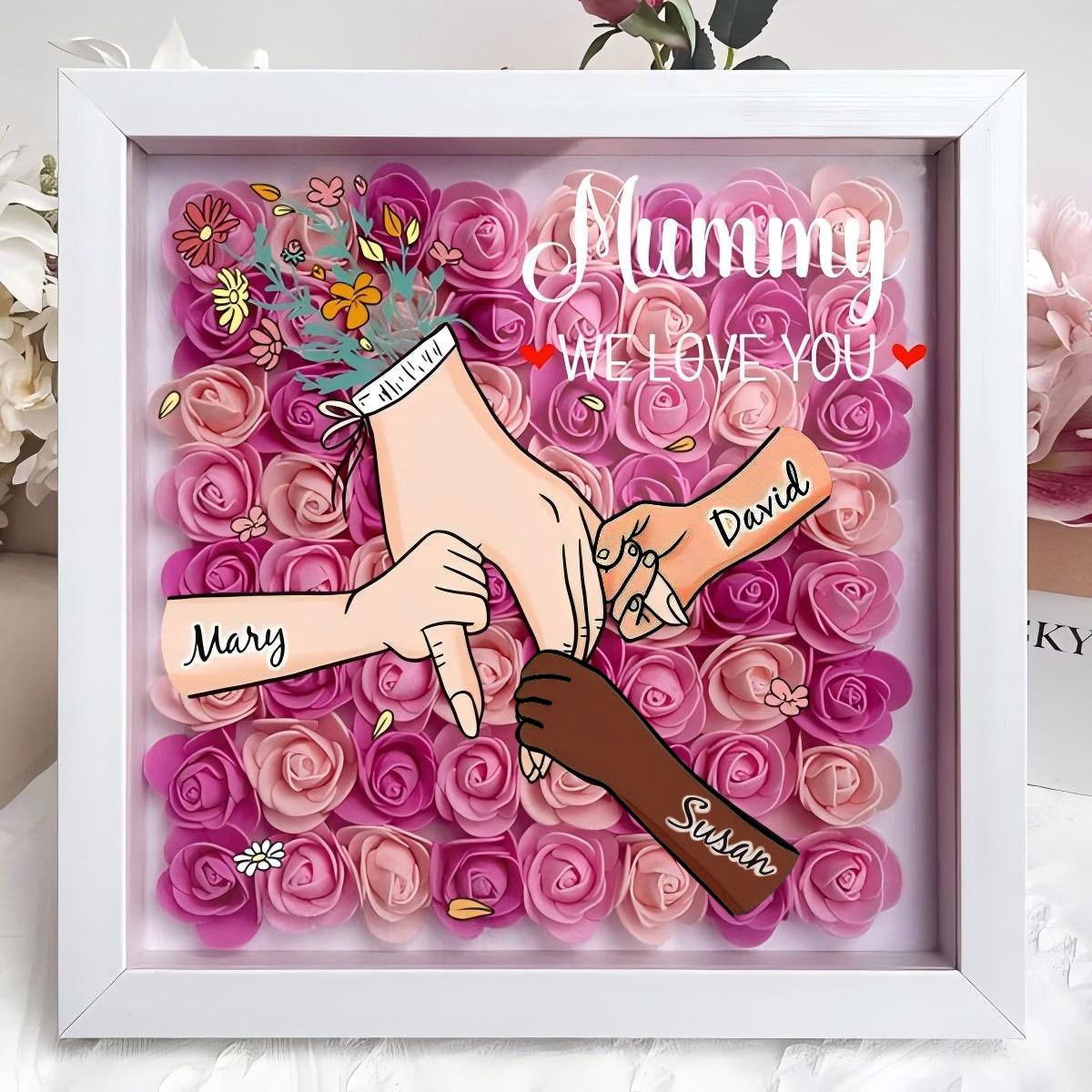 custom-hand-holding-family-flower-shadow-box-with-multiracial-family-different-skin-tones-mother-s-day-gift